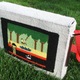 Illustration for article titled Pitfall Bag Celebrates Man's Two Passions: Adventure and Needlepoint